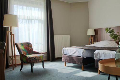 En eller flere senge i et værelse på De Roode Leeuw Terborg