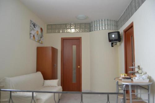 Televízia a/alebo spoločenská miestnosť v ubytovaní My Angels B&B