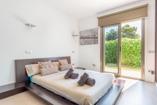 Postel nebo postele na pokoji v ubytování Villa Zoe