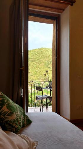 Ein Bett oder Betten in einem Zimmer der Unterkunft La Casa sul Blu Albergo Diffuso