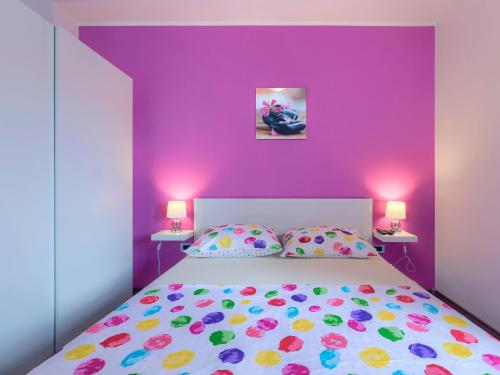 Una cama o camas en una habitación de Holiday Home Duje & Mare by Interhome