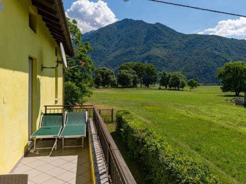 a balcony with chairs and a view of a field at Apartment Pippo by Interhome in Masina