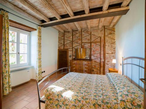 Postel nebo postele na pokoji v ubytování Apartment Borgo Alba Chiara-2 by Interhome