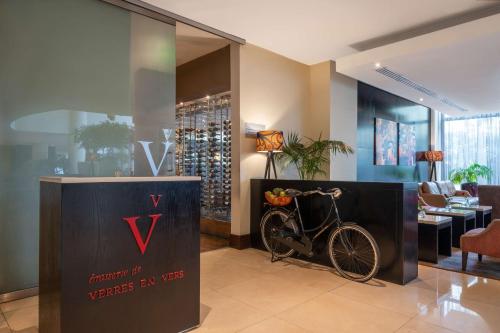 a bike parked in a room with a wine store at Radisson Blu Hotel, Addis Ababa in Addis Ababa