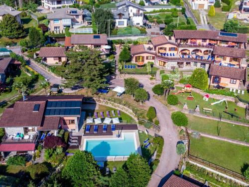an aerial view of a house with a swimming pool at Apartment Residenza Agrifoglio-8 by Interhome in Luino