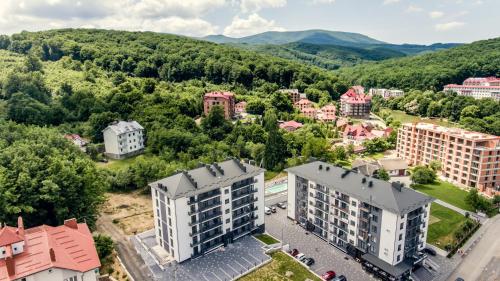 ポリアナにあるArena Apart - Hotelの建物のある都市の航空写真
