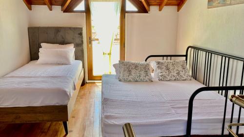 Ένα ή περισσότερα κρεβάτια σε δωμάτιο στο Katya's home