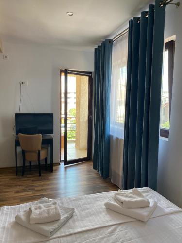 Postel nebo postele na pokoji v ubytování Portobello