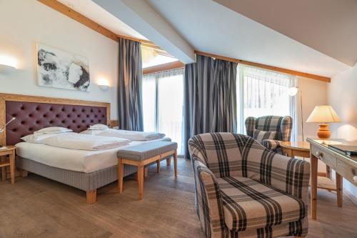 Posteľ alebo postele v izbe v ubytovaní Hotel Kaiserhof Kitzbühel, 4 Sterne Superior