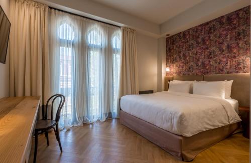 Postel nebo postele na pokoji v ubytování Abanotubani Boutique hotel