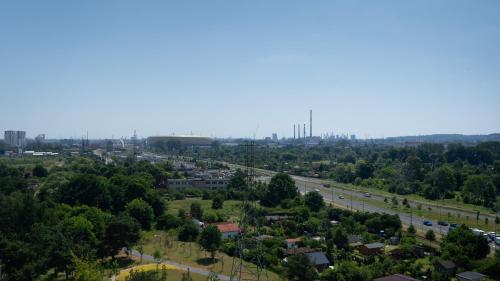 an aerial view of a city with a highway at Apartamenty Gdansk EU - Baltica Towers 223 in Gdańsk