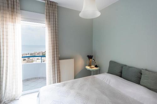 Llit o llits en una habitació de Vanilla Luxurious Apartment