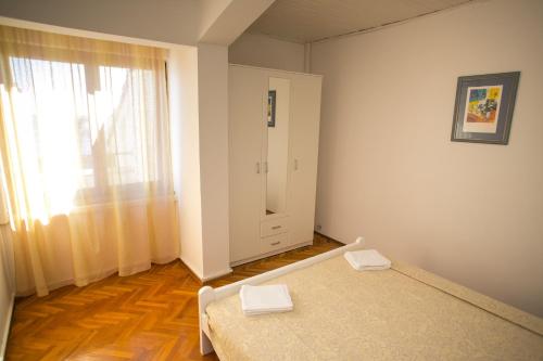 Ένα ή περισσότερα κρεβάτια σε δωμάτιο στο Apartments Ostrea - Ana
