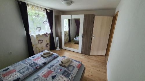 Ένα ή περισσότερα κρεβάτια σε δωμάτιο στο Apartment Tijana