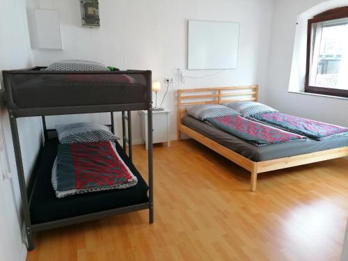 Postel nebo postele na pokoji v ubytování Klein aber fein II