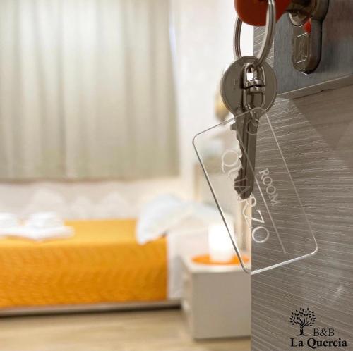 a close up of a room with a bed and a lock at La Quercia in Pachino