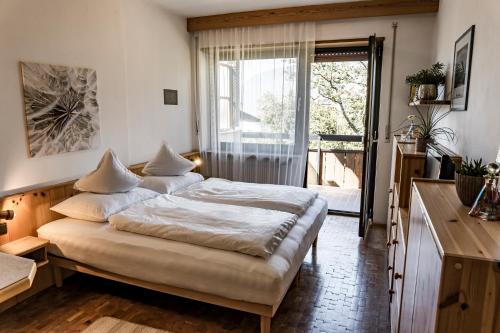 Een bed of bedden in een kamer bij Residence Greymold
