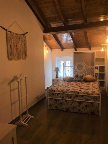 Ένα ή περισσότερα κρεβάτια σε δωμάτιο στο Casa D'Aldeia