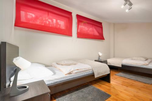 Posteľ alebo postele v izbe v ubytovaní Apartmani Toplice