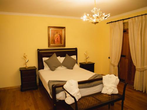 Ένα ή περισσότερα κρεβάτια σε δωμάτιο στο Casa da Igreja