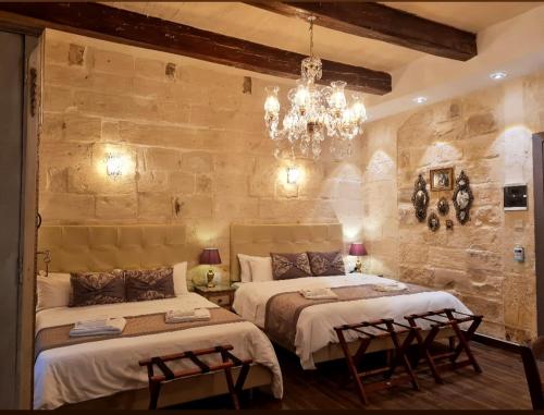 Кровать или кровати в номере Casa Asti