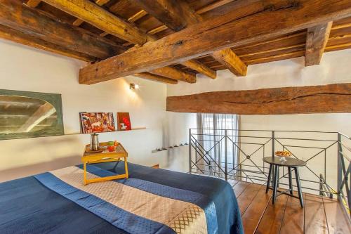 Posteľ alebo postele v izbe v ubytovaní L’Antico borgo di Trastevere