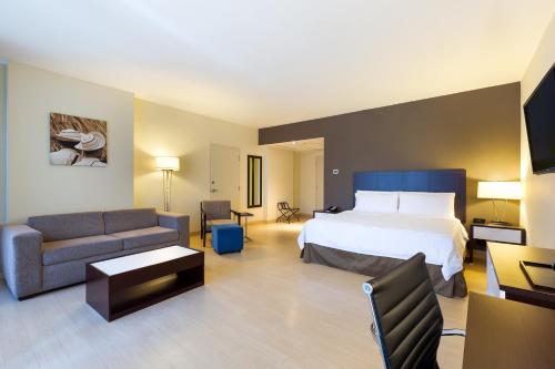 Postel nebo postele na pokoji v ubytování Holiday Inn Panama Distrito Financiero by IHG