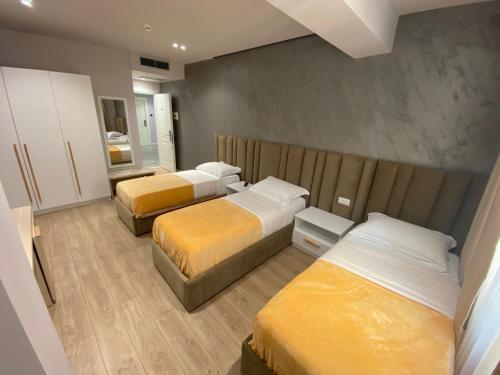 Postel nebo postele na pokoji v ubytování Hotel Alion