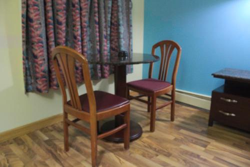 A seating area at American Inn and Suites