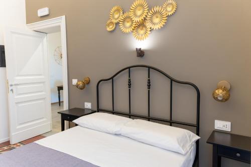 Postel nebo postele na pokoji v ubytování Ursino's Luxury