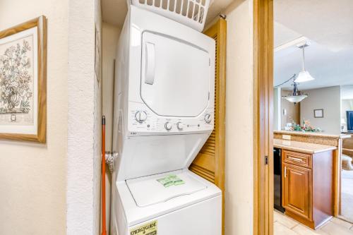 a white washer and dryer in a kitchen at Kaanapali Shores 706 in Kaanapali
