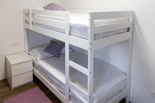 Ένα ή περισσότερα κρεβάτια σε δωμάτιο στο ININ APARTMENTS