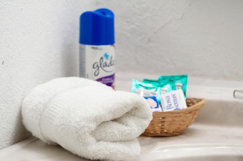 a pile of towels sitting on a bathroom sink at Suite 5A, Altavista, Garden House, Welcome to San Angel in Mexico City