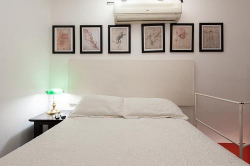 Suite 4B Bazzar, Garden House, Welcome to San Angel tesisinde bir odada yatak veya yataklar