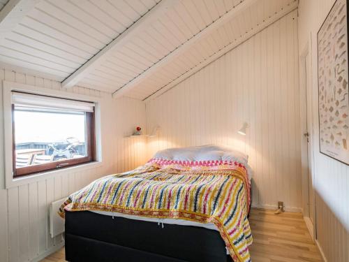 Ένα ή περισσότερα κρεβάτια σε δωμάτιο στο 4 person holiday home in Fanø