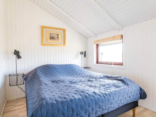 Ένα ή περισσότερα κρεβάτια σε δωμάτιο στο 4 person holiday home in Fanø