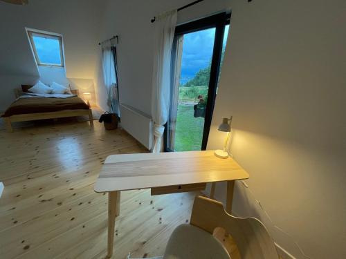 Ein Bett oder Betten in einem Zimmer der Unterkunft Na Kaszubskim Wzgórzu z sauną i banią