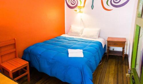 Un ou plusieurs lits dans un hébergement de l'établissement Dragonfly Hostels Cusco