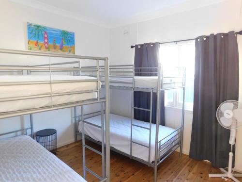 Katil atau katil-katil dalam bilik di Secret at Sussex Inlet Units
