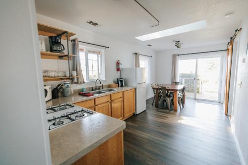 a kitchen with a sink and a stove top oven at View Crest Lodge in Trinidad