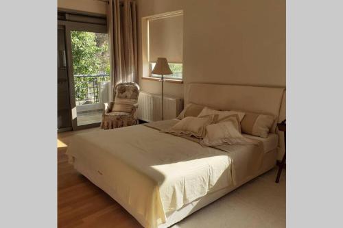 Giường trong phòng chung tại Virna s home