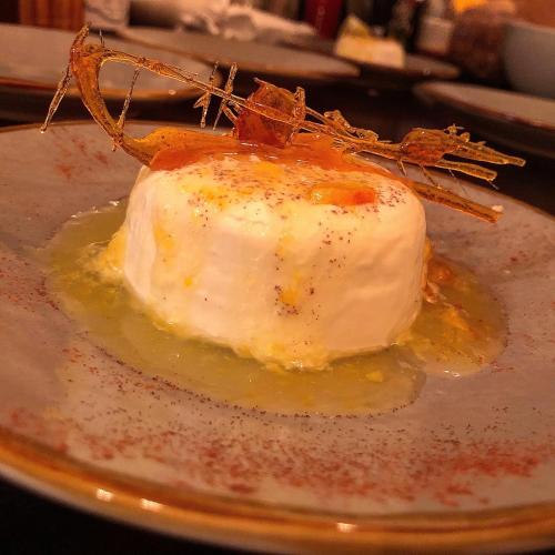 a piece of cake on a plate with sauce at Podere Bellavista in San Gimignano