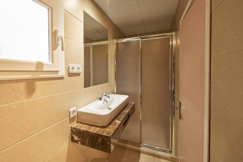 Un baño de Checkin Flamingo