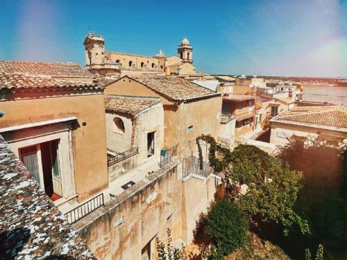 an aerial view of a city with buildings at Palazzo Gambuzza in Ispica
