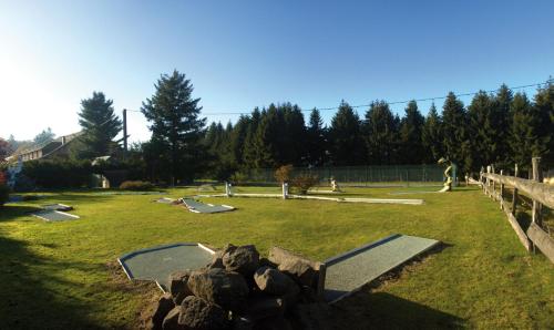 a park with a bunch of animals in the grass at Le Gîte du Donon in Grandfontaine