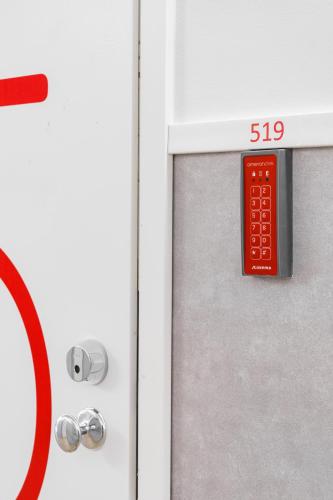 a close up of a gas station door with a thermometer at Omena Hotel Tampere in Tampere