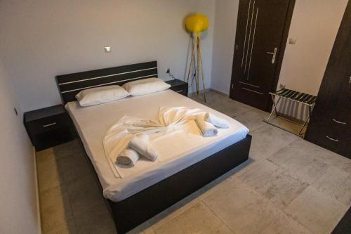 Posteľ alebo postele v izbe v ubytovaní The Garden House