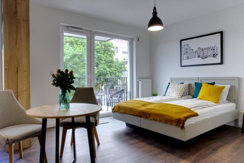 Posteľ alebo postele v izbe v ubytovaní Essence Apartments Sapphire