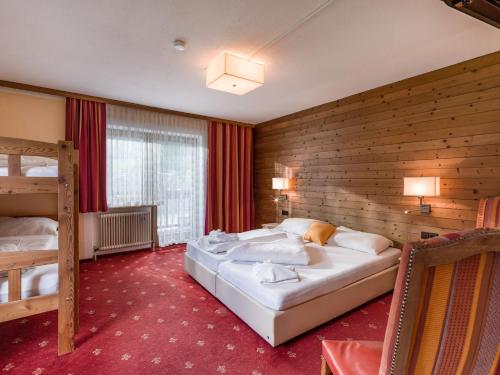 Postel nebo postele na pokoji v ubytování Hotel Restaurant Sidan