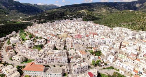an aerial view of a village in the mountains at Apulia Bed&Breakfast in Mattinata
